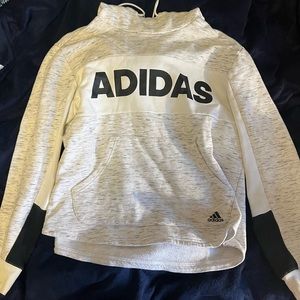 White Adidas hoodie.